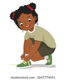 Menina africana amarrando os cadarços