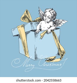 Little angel in a present box.