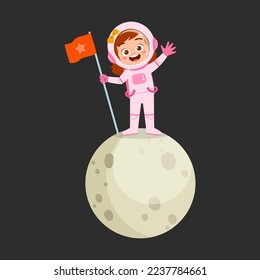 little astronaut costume and stand on moon holding flag