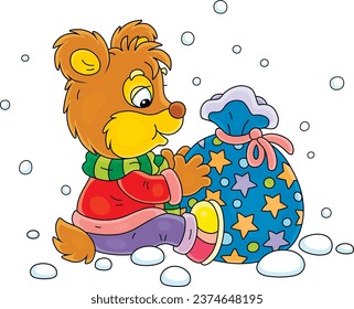 Little baby bear with its gift bag on a snowy holiday winter day, vector cartoon illustration on a white background