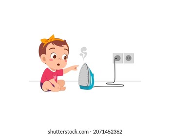 little baby curious to touch hot electric iron