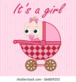 Little baby girl sitting in the baby carriage.