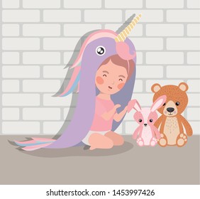 little baby girl with stuffed toys and costume