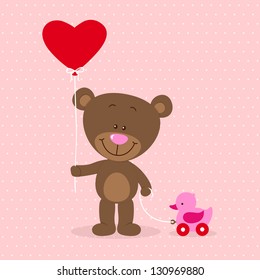 Little bear with heart balloon and toy