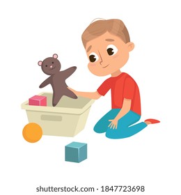 Little Big-eyed Boy Picking up Toys in Box Vector Illustration