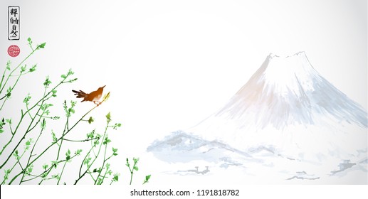 Little bird on green tree branches and Fujiyama mountain. Traditional Japanese ink painting sumi-e. Contains hieroglyphs - zen, freedom, nature.