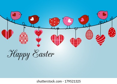 Little birds and easter basket with eggs