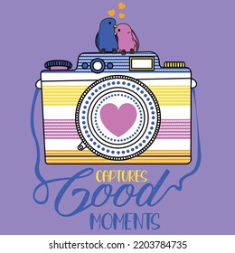 LITTLE BIRDS IN LOVE LOOKING UP ON A PHOTOGRAPHIC CAMERA