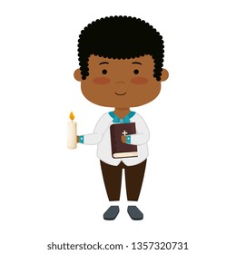 little black boy with bibble and candle first communion