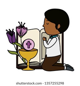 little black boy kneeling with bible and chalice first communion