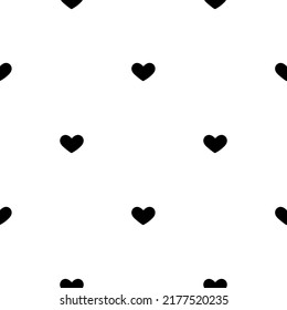 Little black hearts. Seamless pattern with polka dots.