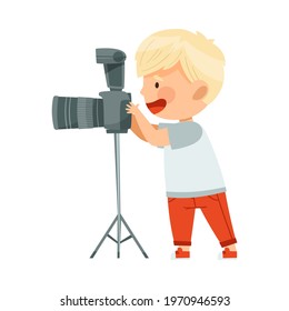 Little Blond Boy with Camera on Stand Taking Photograph Vector Illustration