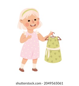 Little Blond Girl in Her Childhood Holding Pretty Dress on Clothes Hanger Vector Illustration