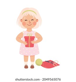 Little Blond Girl in Her Childhood Holding Wrapped Gift Box Vector Illustration