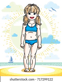 Little blonde girl toddler standing on sunny beach and wearing swimming suit. Vector kid illustration. Summer holidays theme.