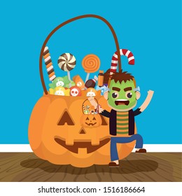 little boy with candies pumpkin vector illustration design