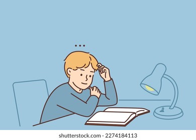 Little boy child sit at table at home studying with textbook under lamp. Smart kid enjoy reading at desk. Education and literature. Vector illustration. 