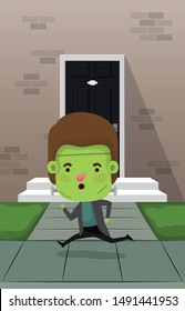 little boy with costume of frankenstein in house door