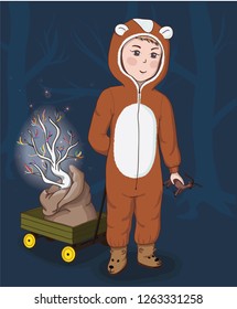 Little boy in cute bear costume with a magic tree in his pushcart
