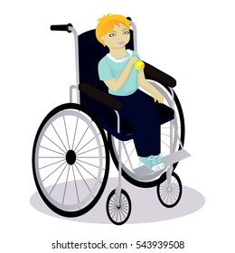 little boy with disabilities in a wheelchair have a medal