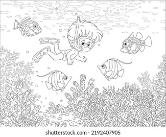 Little boy with a diving mask, flippers and a snorkel diving with amusing tropical fishes on a coral reef on summer vacation, black and white outline vector cartoon illustration for a coloring book