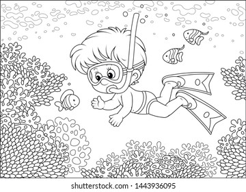 Little boy diving with a mask and a snorkel among funny striped fishes on a coral reef in a tropical sea, black and white outline vector illustration in a cartoon style for a coloring book