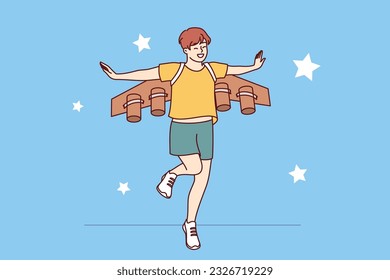 Little boy dreams of becoming pilot or astronaut and jumps in suit with airplane wings. Cheerful teenager imagines that became professional pilot and went to fly through starry sky