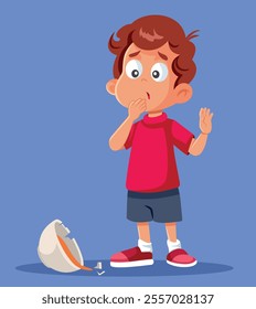 
Little Boy Dropping Bowl of Food Vector Cartoon Illustration. Little kid making a disastrous mistake in the kitchen 
