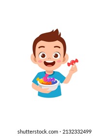 little boy eat sweet candy and feel happy