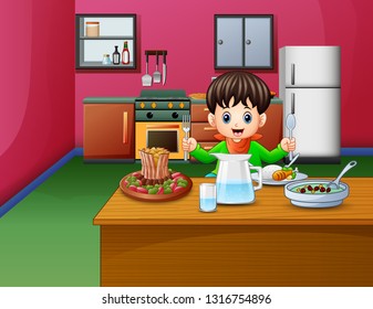 Little boy eats sitting at the dining table