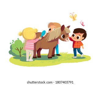 Little boy feed the pony. Girl brushing pony with comb. Kids with animals. Pets care. Summer background.