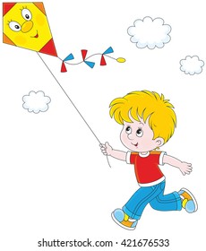 Little boy flying a kite