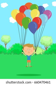 Little boy flying with multicolored balloons on meadow