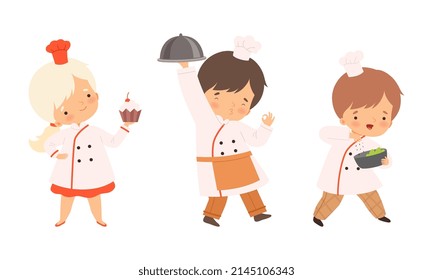 Little Boy and Girl Chef in White Toque and Jacket Holding Tray with Appetizing Dish and Cake Vector Set