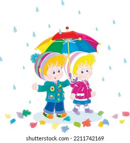 Little boy and girl hiding from the rain under their colorful umbrella while walking through fallen leaves on a rainy autumn day, vector cartoon illustration isolated on a white background