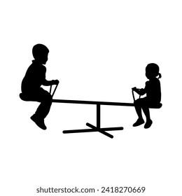 Little boy and little girl on a seesaw, happy girl and boy kids swinging on seesaw together silhouette