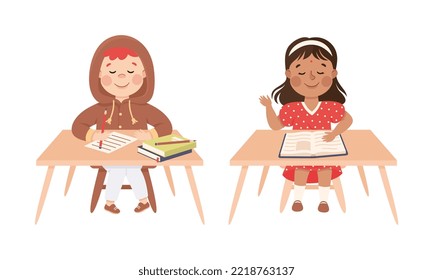 Little Boy and Girl Pupil Sitting at Table with Book Engaged in Elementary Education Vector Set