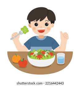 A Little Boy happy to eat salad. He love vegetables. Healthy foods with benefits. Healthy and vegan food concept.