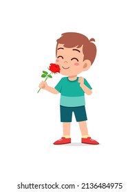 Little Boy Holding Flower And Sniff The Scent