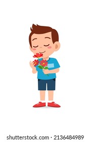 little boy holding flower and sniff the scent