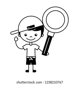 little boy holding magnifying glass
