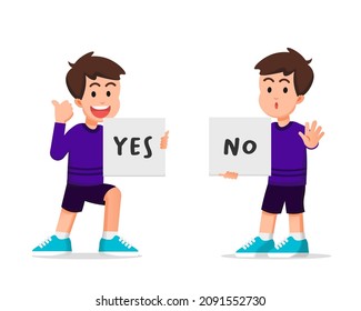 Little boy holding a paper that says yes and no