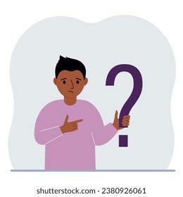 Little boy holding a question mark symbol. Ask questions and look for answers. FAQ or frequently asked questions concept, online support center.