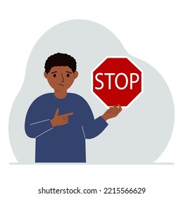 Kleiner Junge, der ein rotes Stoppschild in der Hand hält. Vektorgrafik