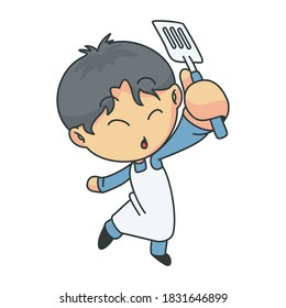 Little Boy Holding Spatula In Hand