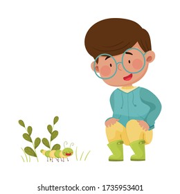 Little Boy Hunkering Down Exploring Worm Crawling on the Ground Vector Illustration
