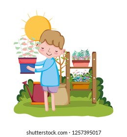 little boy lifting houseplant with shelf in the garden