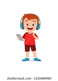 little boy listening music from the smartphone