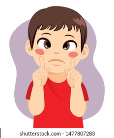 Little boy looking fingers squinting eye health problem concept