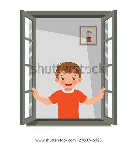 Little boy opening window enjoying fresh air in the morning